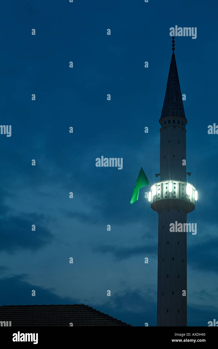 Minaret of a Mosque Silhouetted Against a Deep Blue Dusk Sky Banja Luka Bosnia Herzegovina Stock Photo