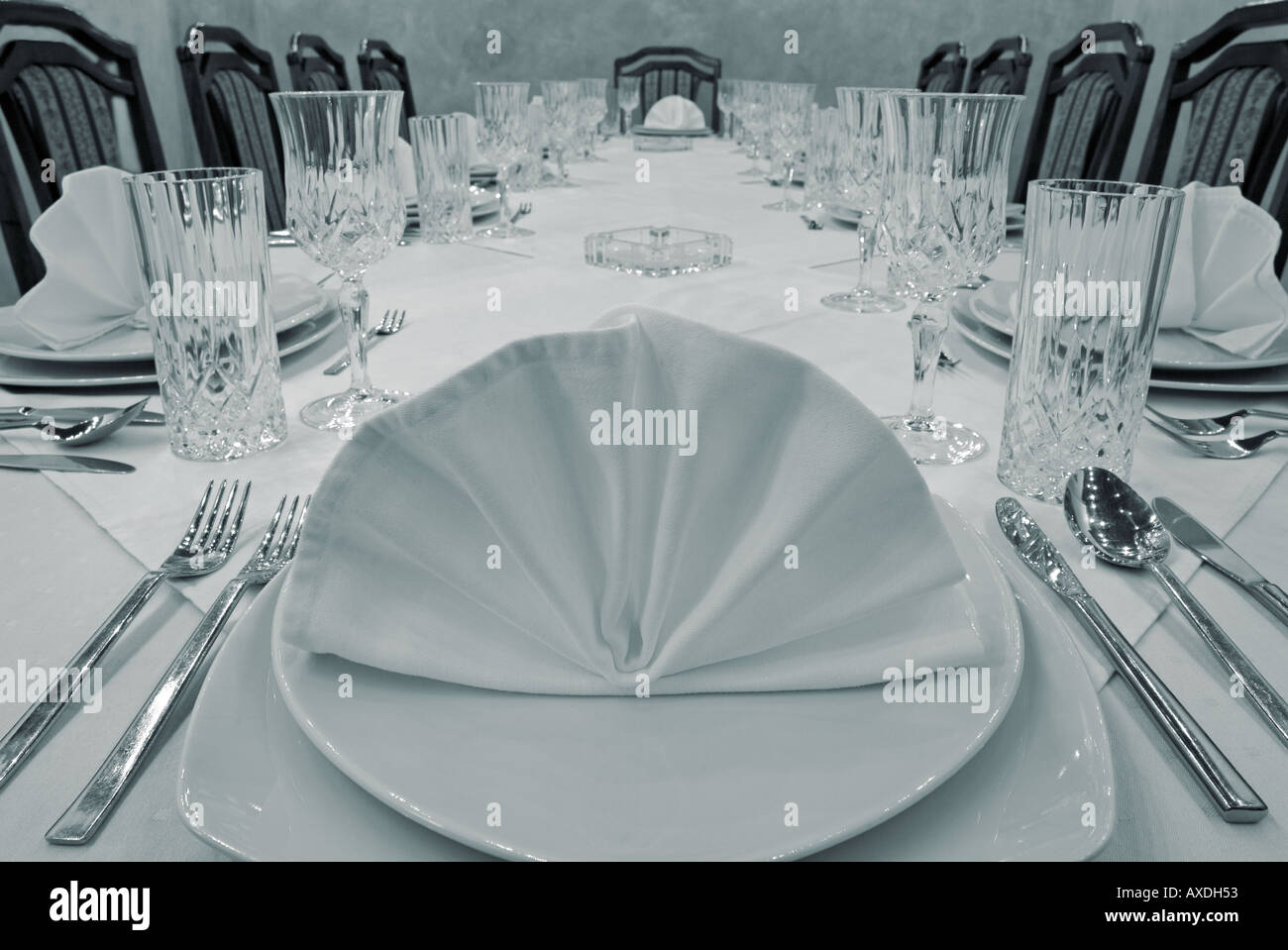 Place settings on a Dining Table Stock Photo
