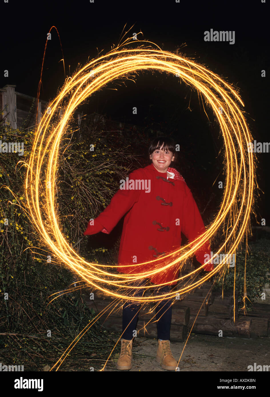 young girl with sparkler fireworks. Stock Photo