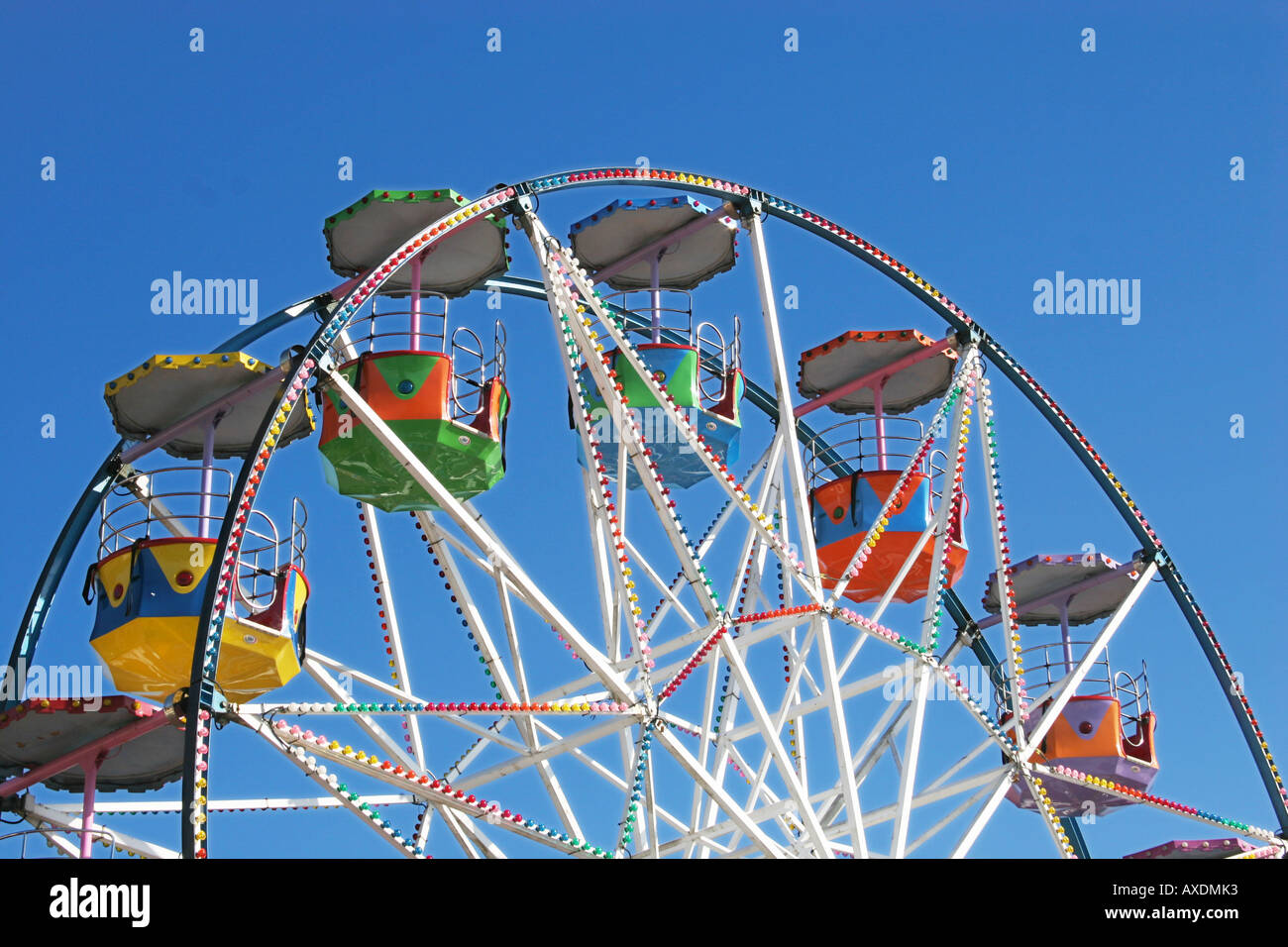 Top section of big wheel in fair ground. Stock Photo