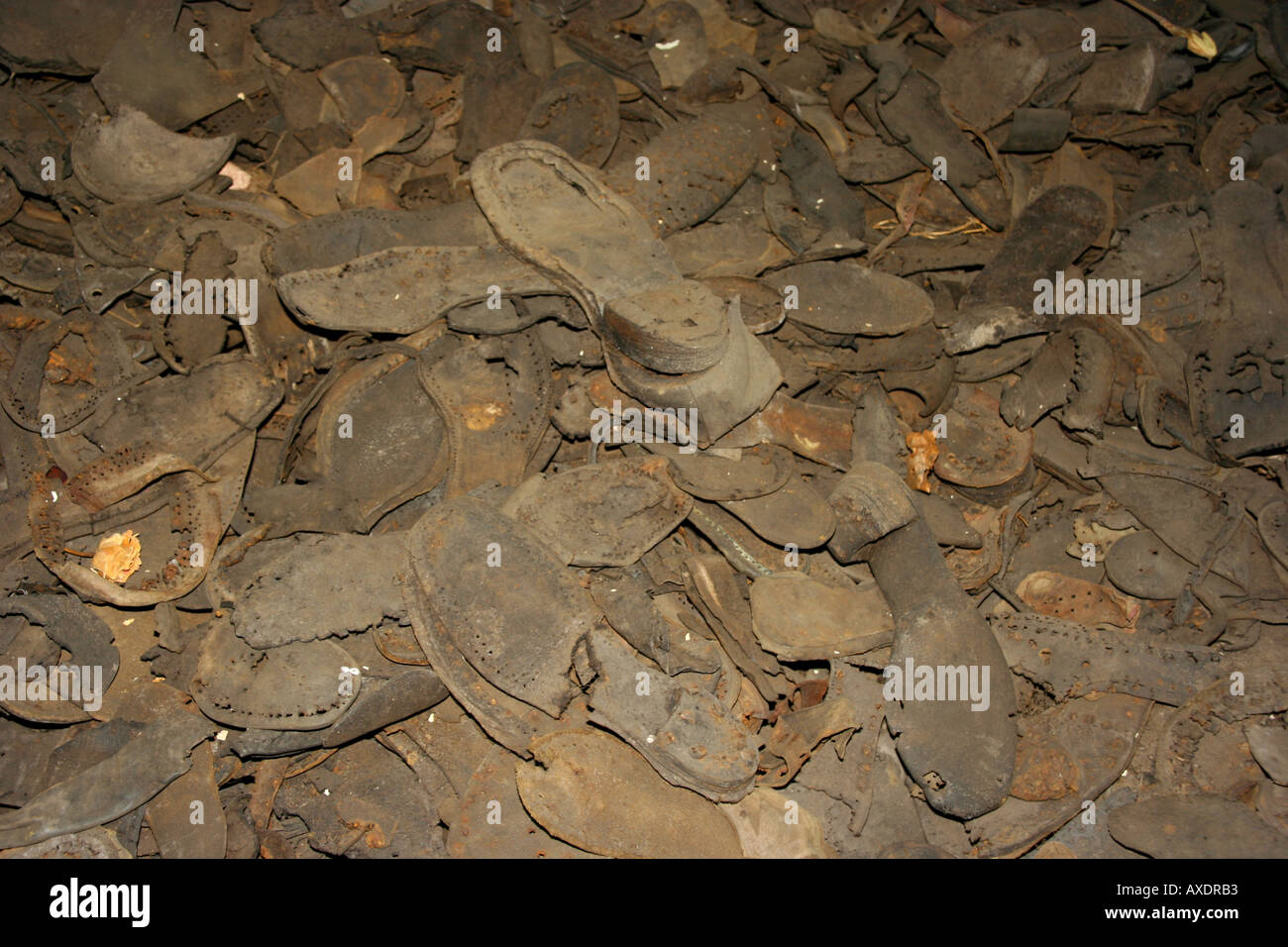 Heap of shoes worn by prisoners in Stutthof Concentration Camp Stock