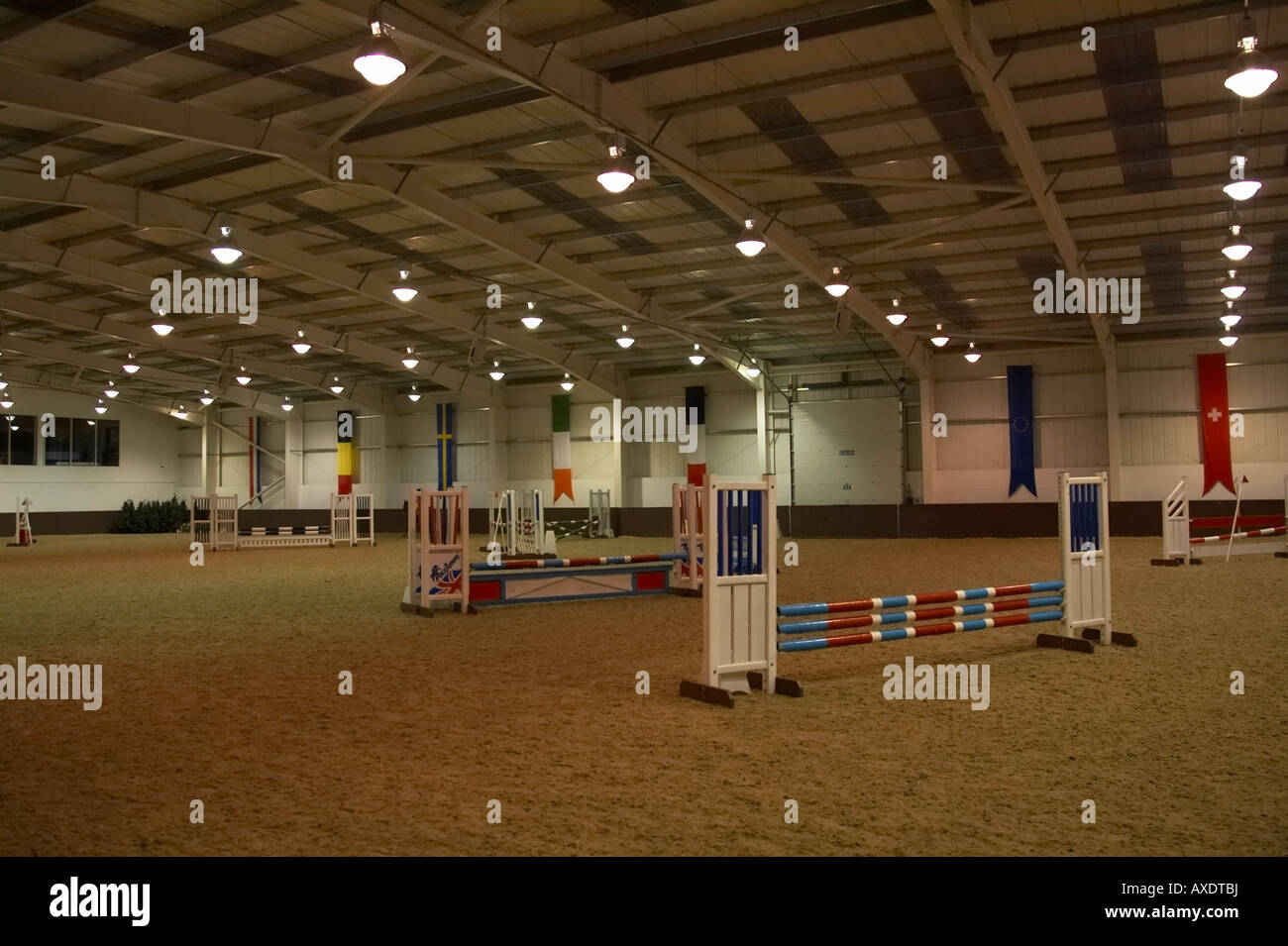 Indoor horse jumping arena Stock Photo Alamy