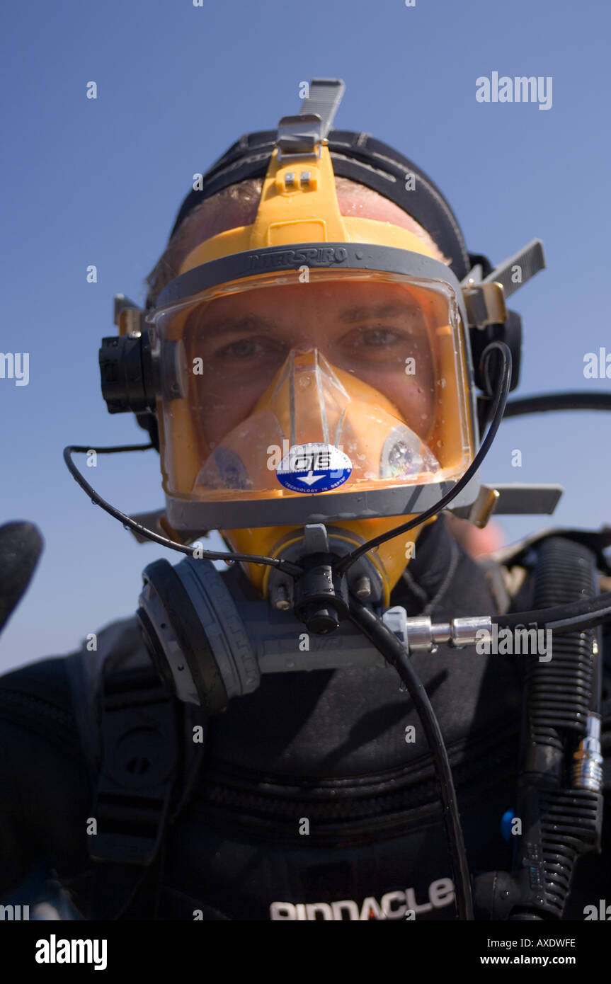 Diver wearing an Aga mask to dive with great white sharks, Guadalupe Island, Mexico Stock Photo