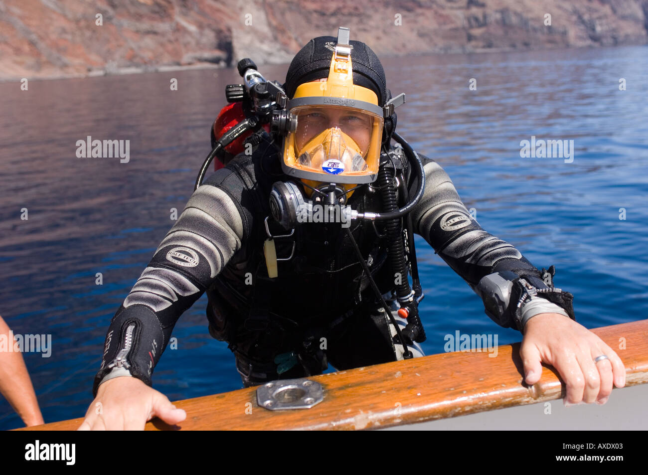 Diver wearing an Aga mask to dive with great white sharks, Guadalupe Island, Mexico Stock Photo