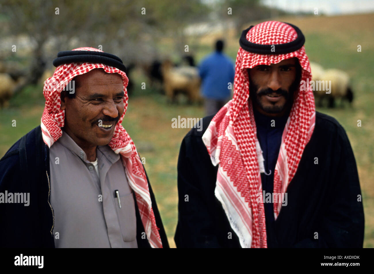Bedouins wearing keffiehs, the traditional bedouin headwear, Jordan. Stock Photo