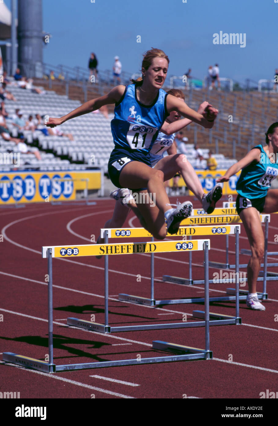 Girl jumping hurdle on running hires stock photography and images Alamy