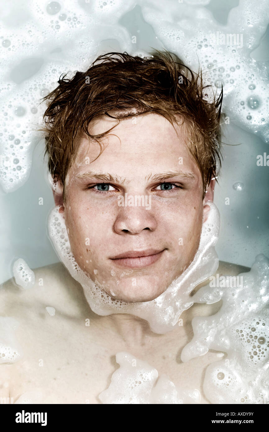 Boy taking a bubble bath Stock Photo Alamy