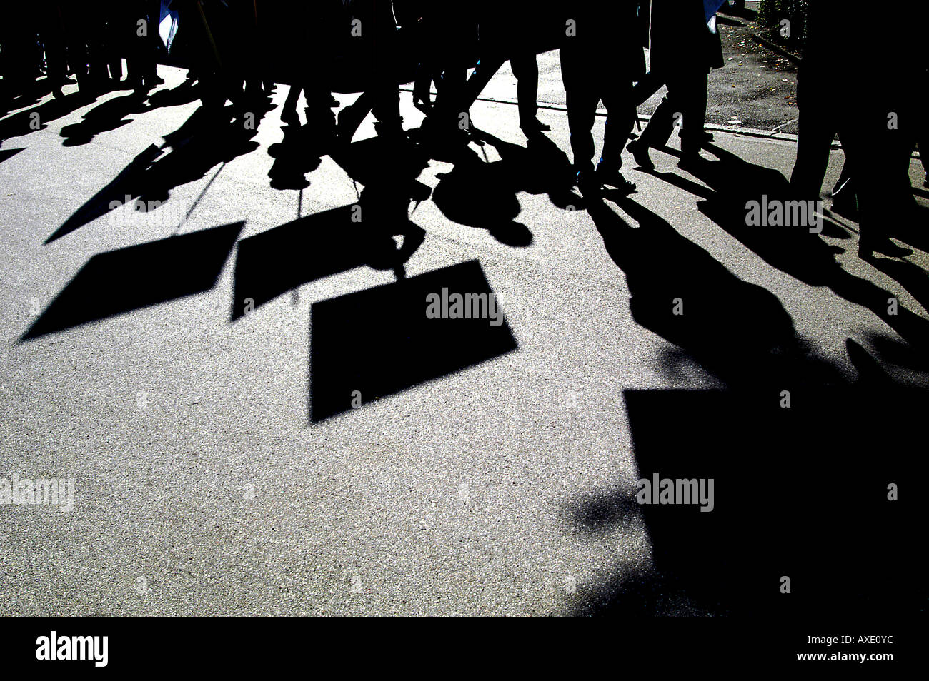 Shadow of demonstrators Stock Photo