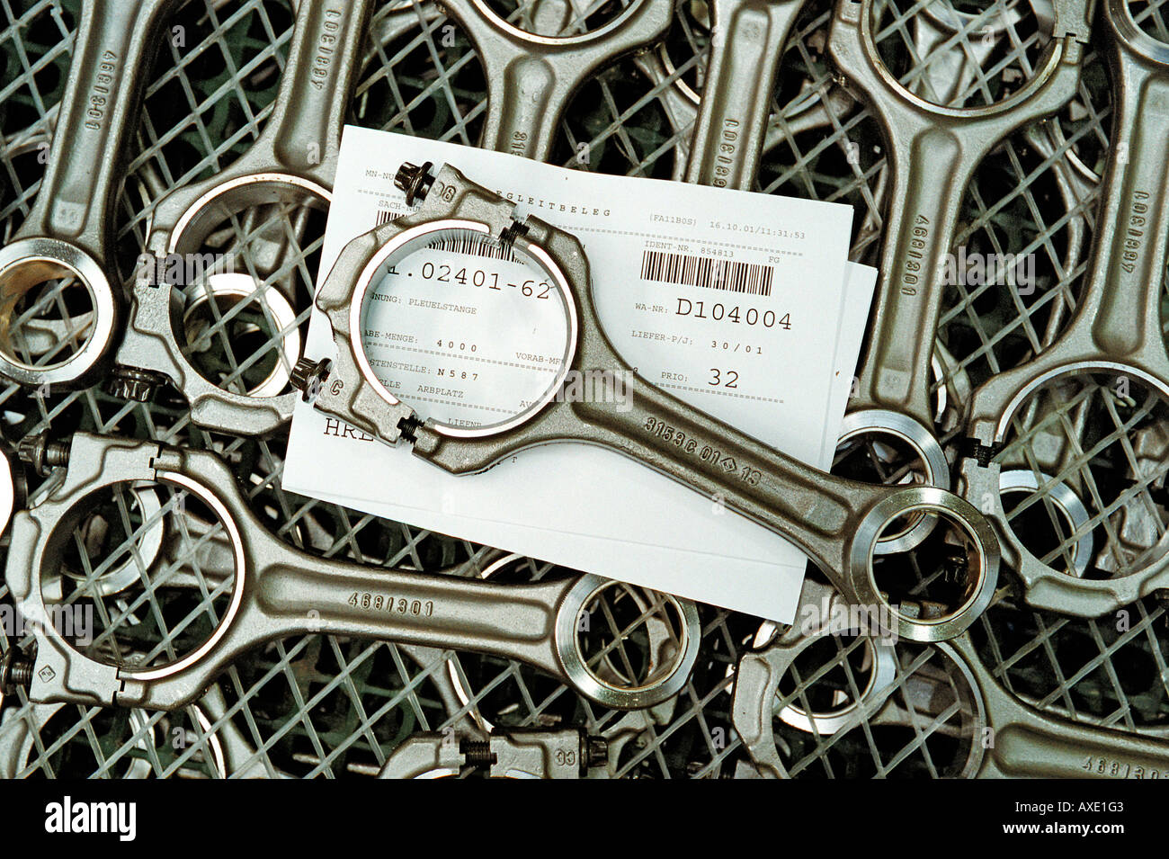 Connecting rods for engine production Stock Photo Alamy