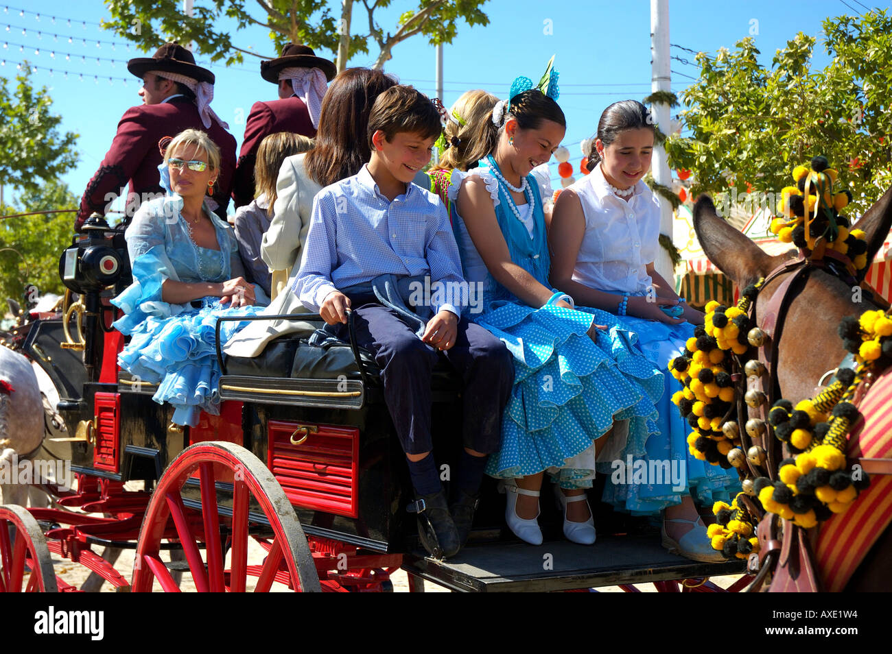 Children on a coach , Feria de Abril , Sevilla , Andalusia , Europe Stock Photo