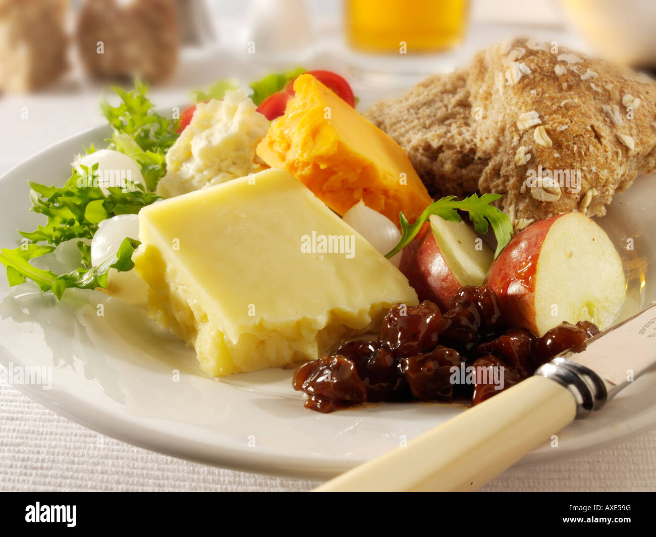 Traditional cheese Ploughman's with Cheddar & Red Leicester in a pub setting Stock Photo