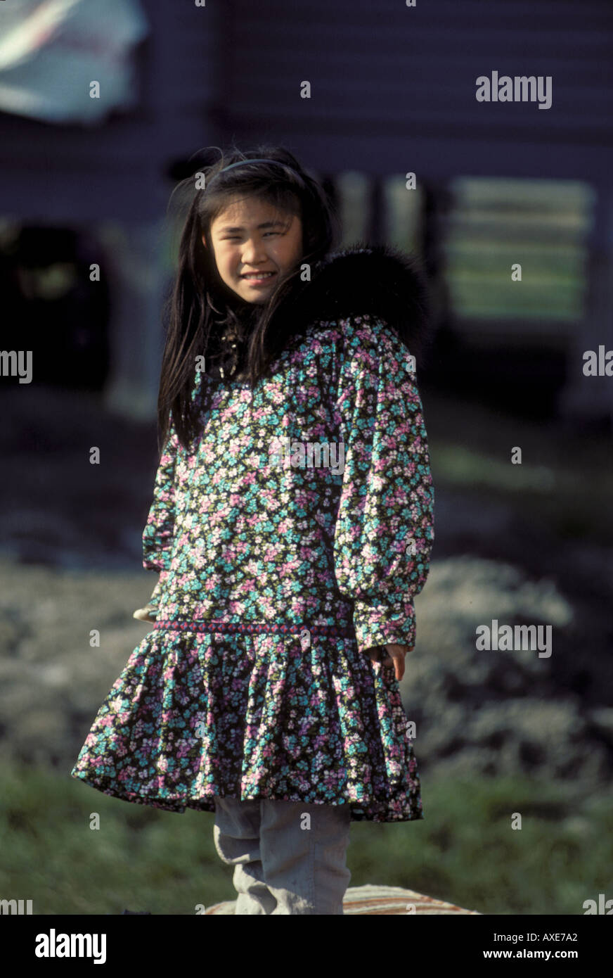 Inuit Eskimo girl in parka with fur trimming town Kaktovik Norht coast Arctic Alaska USA Stock Photo