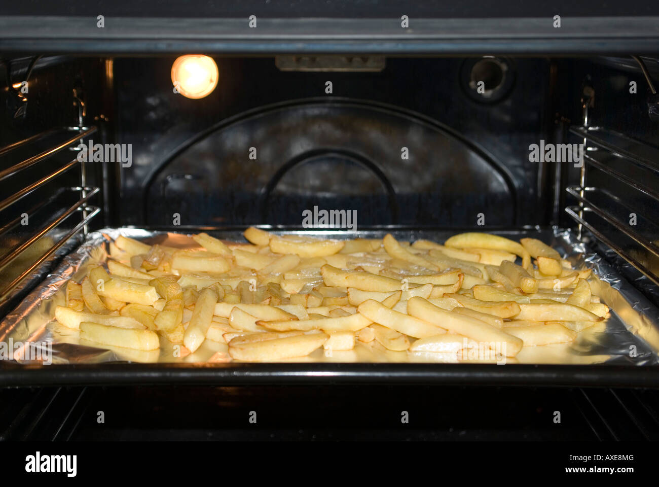 French fries in oven Stock Photo Alamy