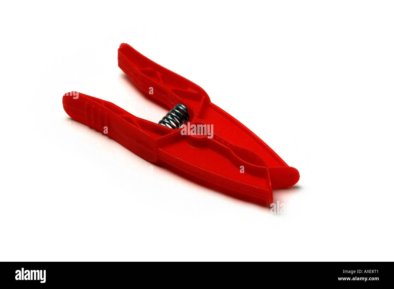 Red plastic clothes peg Stock Photo