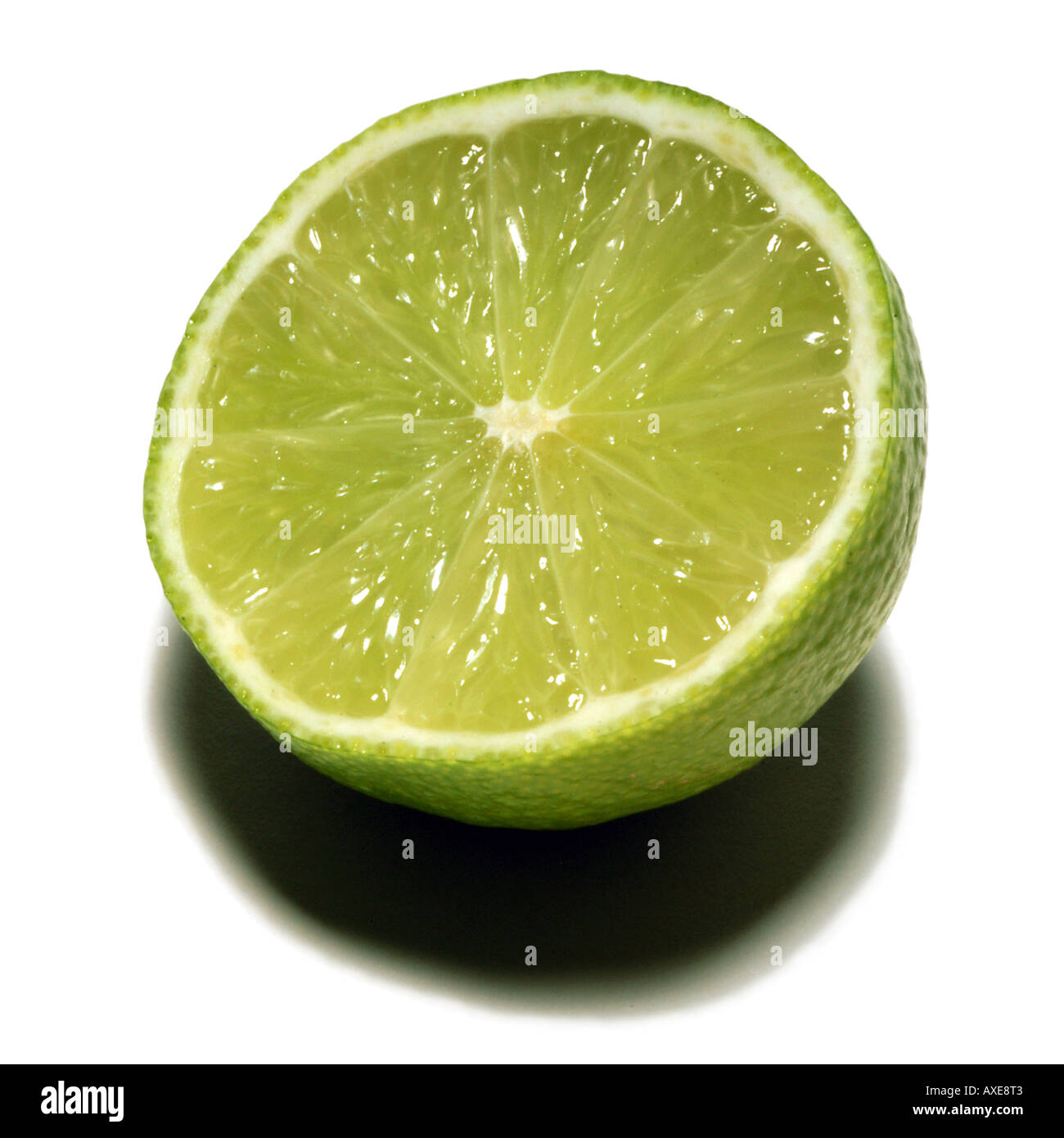 Fresh lime cut in half Stock Photo Alamy