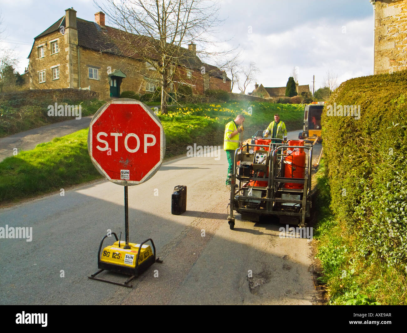 Remotely controlled traffic control sign at road repair work in Lacock