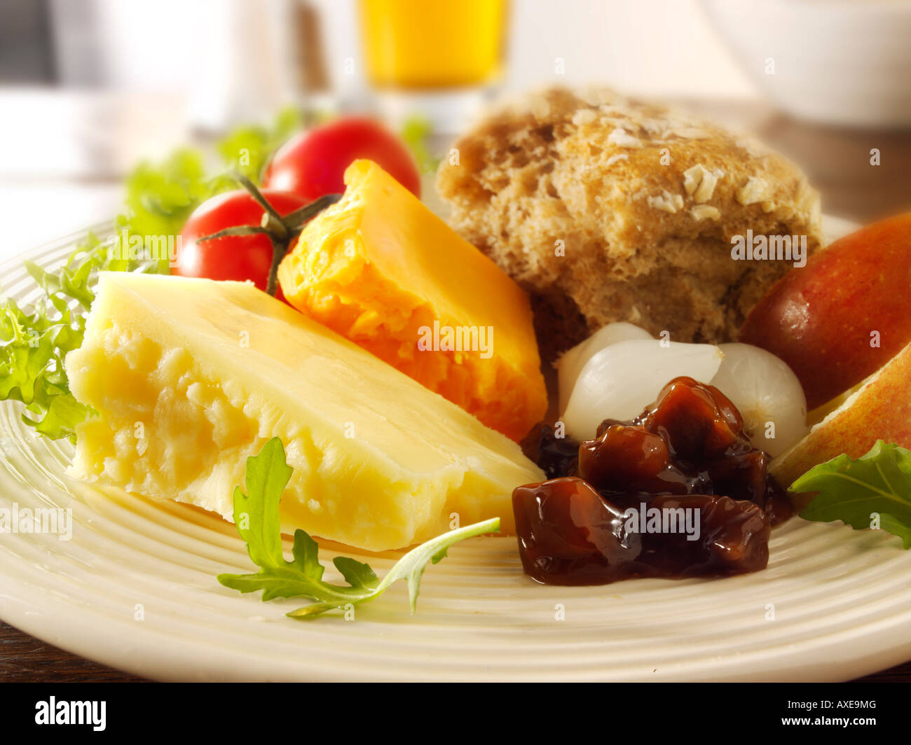 Traditional cheese Ploughman's with Cheddar & Red Leicester in a pub setting Stock Photo