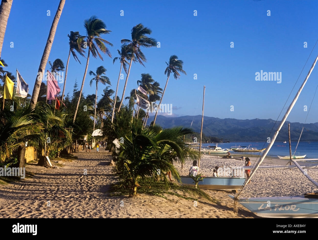 Evening Sunshine on the White Sand Beach at Boracay, Philippines. Stock Photo