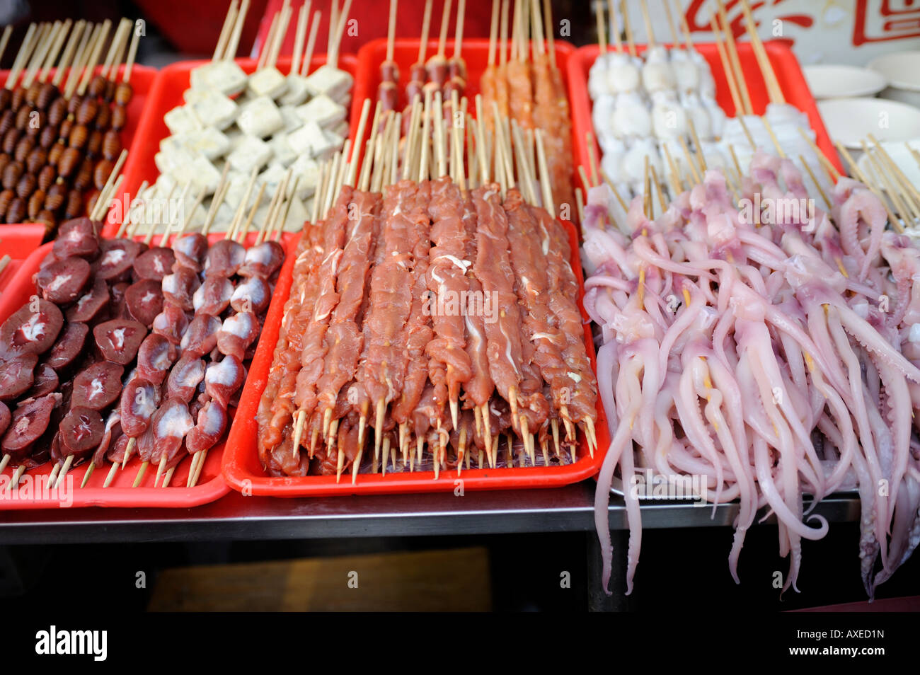 Food to be roasted at night snack market in Donghuamen street in Beijing, China. 23-Mar-2008 Stock Photo
