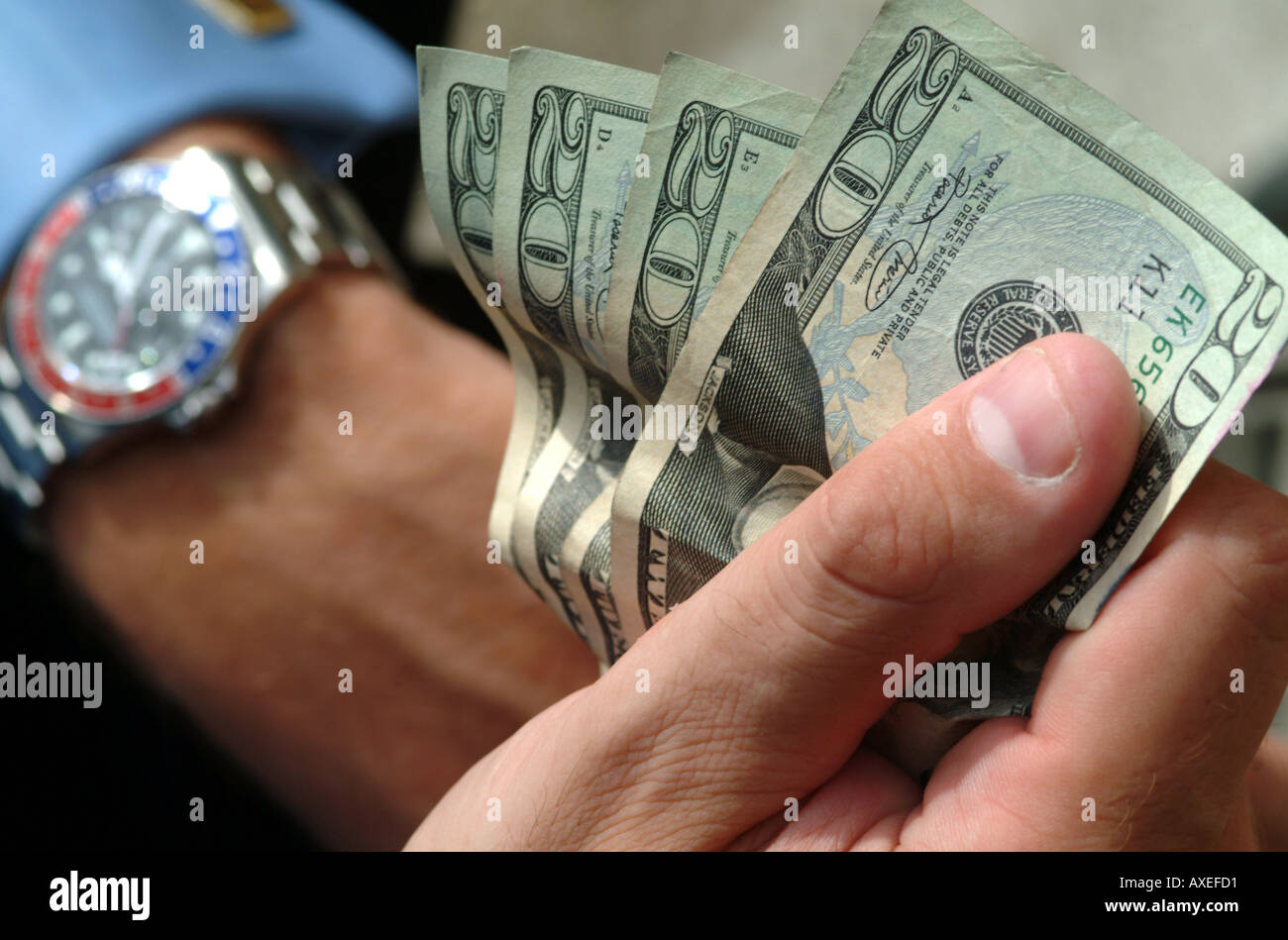 Fistful of US 20 Twenty Dollar Bills or notes and GMT Master Rolex
