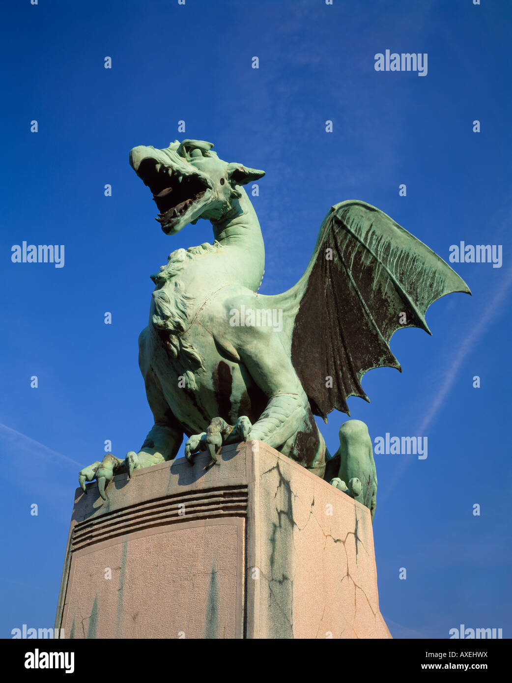 One of the four dragons on the Dragon Bridge, Zmajski Most, across the river Ljubljanica in Ljubljana, Slovenia Stock Photo