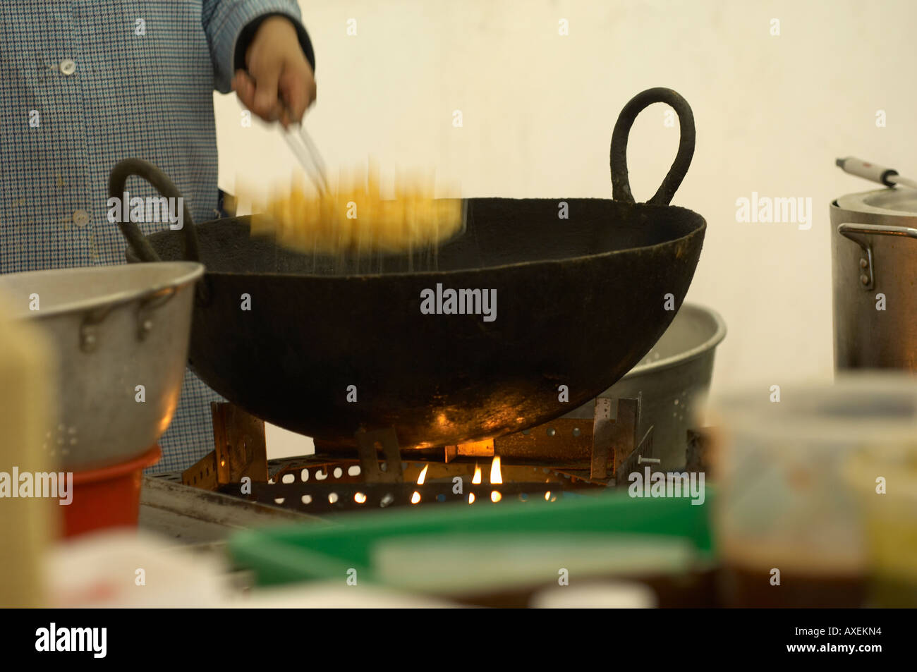 Deep frying in a karahi on large gas burner Stock Photo Alamy