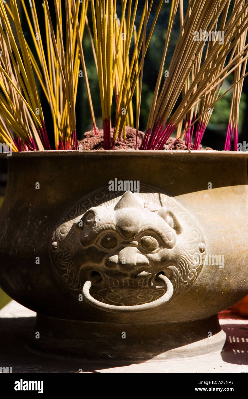 Joss sticks in temple urn hi-res stock photography and images - Alamy