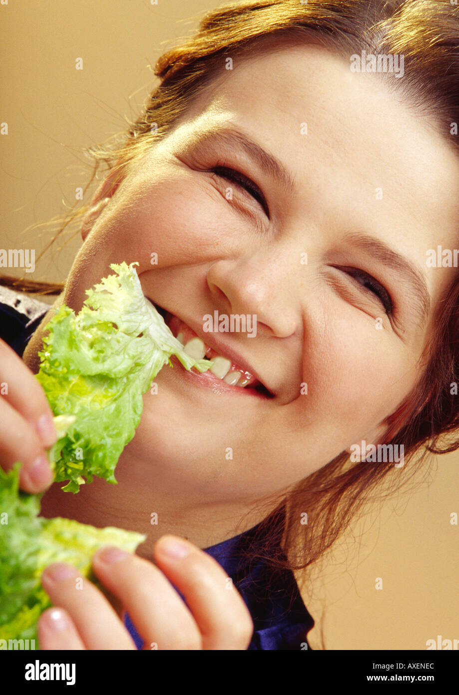 Overweight woman eating lettuce hires stock photography and images Alamy
