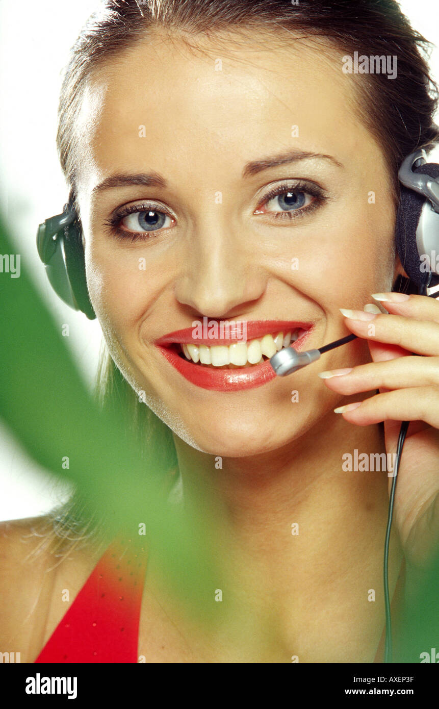 Woman talk headphones in hi-res stock photography and images - Alamy