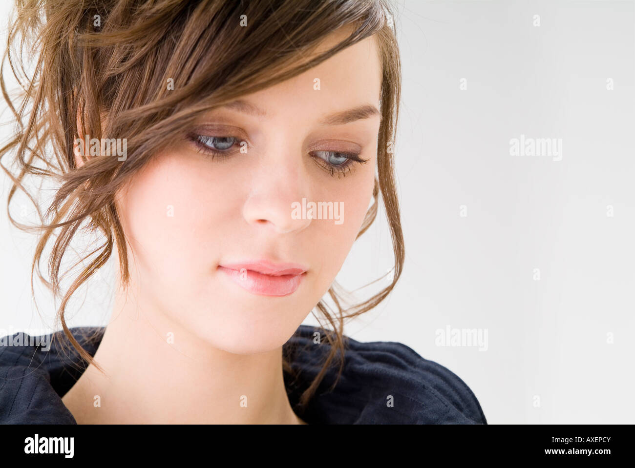 Woman portrait looking down hi-res stock photography and images - Alamy