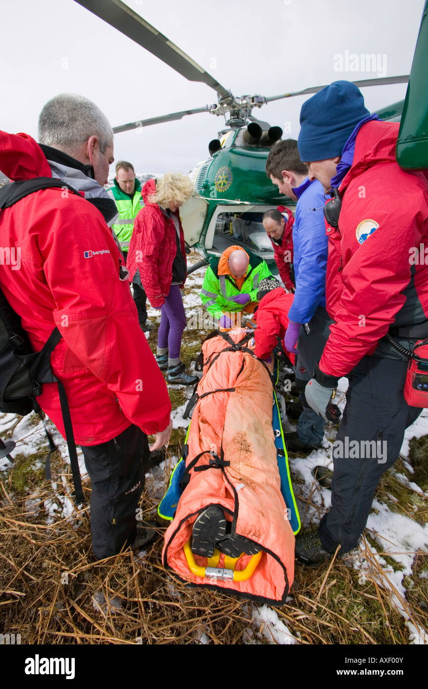 Members of Langdale Ambleside Mountain Rescue Team and an air ambulance