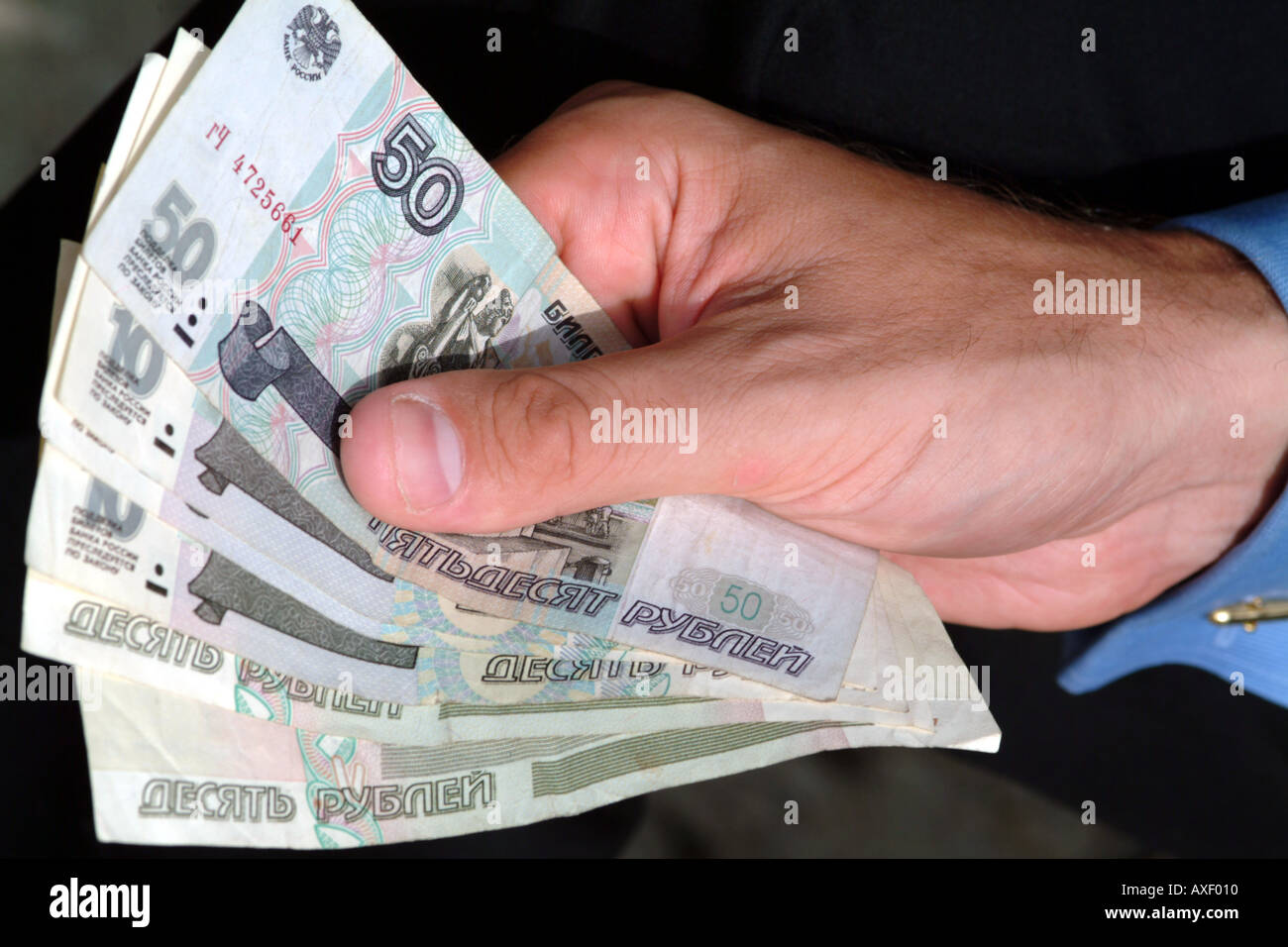 Handful of Roubles Ruble Russia Currency fistfull Stock Photo