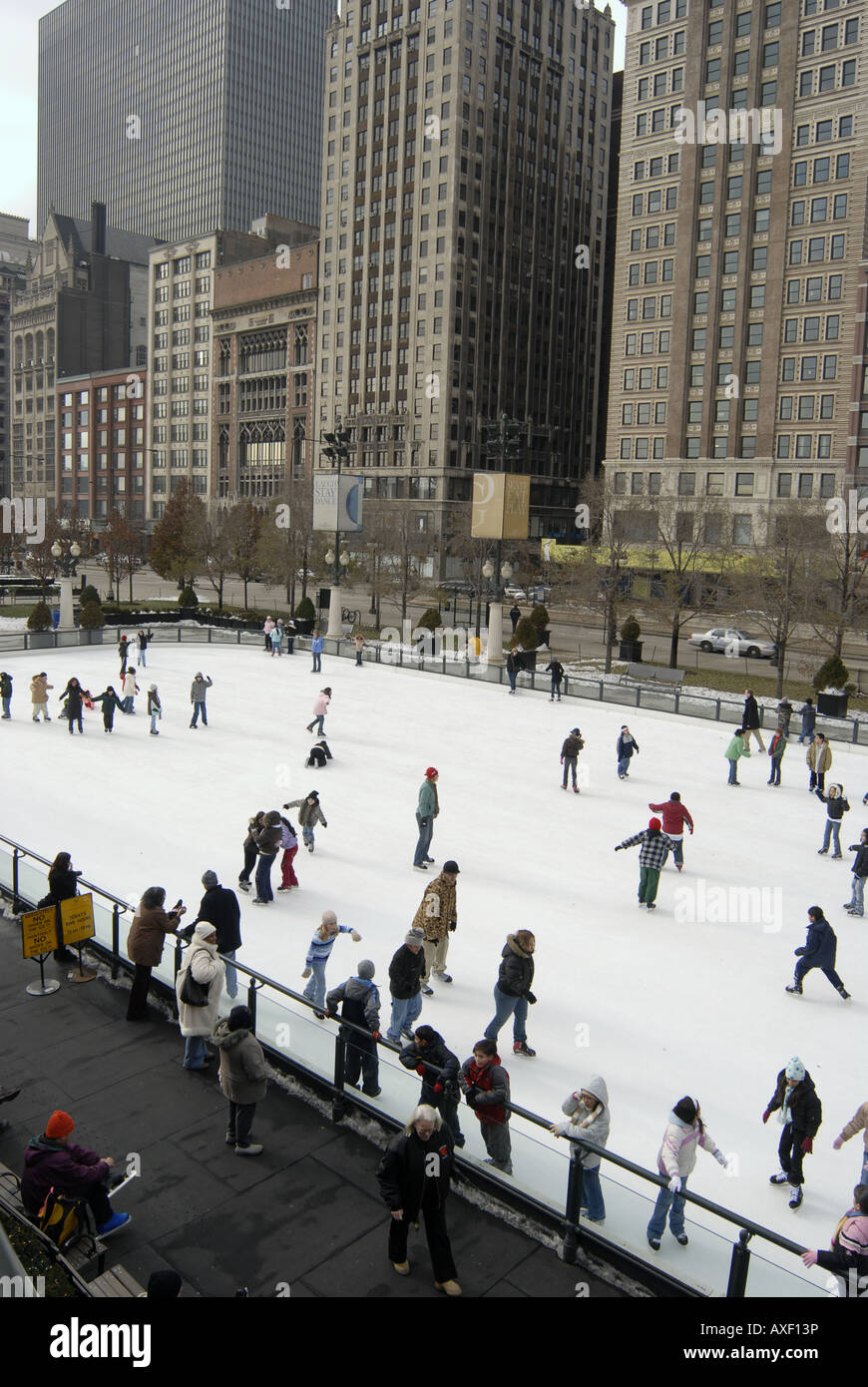Ice skating at Millennium Park in Chicago with Michigan Avenue in the background Stock Photo Alamy