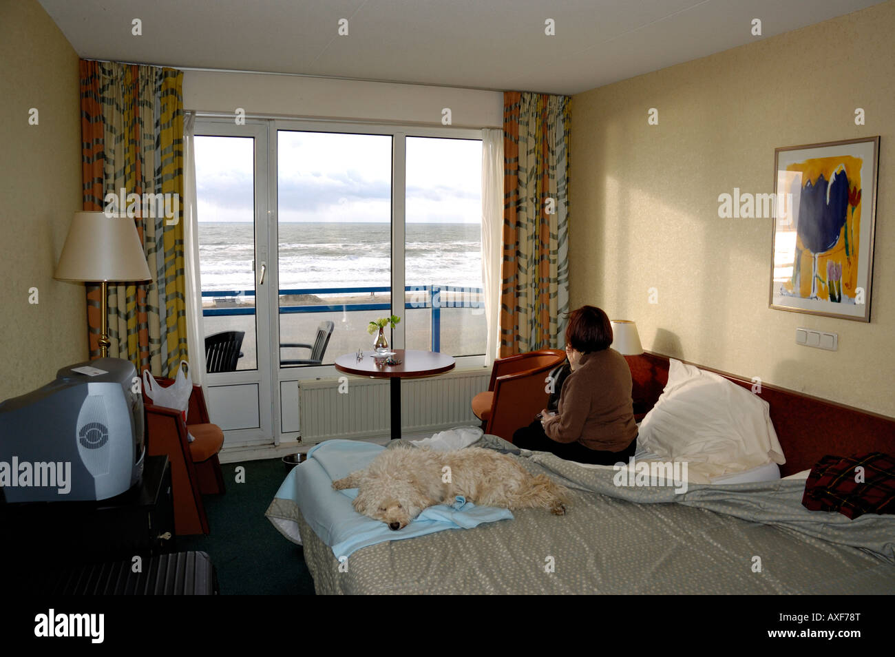 Interior of small seaside hotel room on the North Sea coast in Holland. Stock Photo