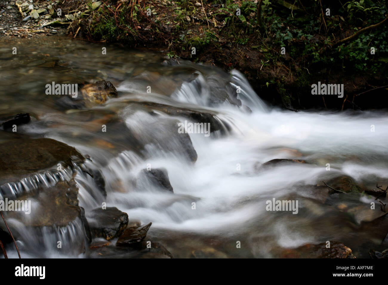 Brook flows down waterfall hi-res stock photography and images - Alamy