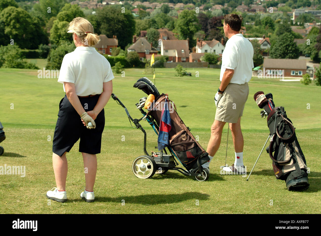 Senior Golfers and golf bags equipment Stock Photo Alamy