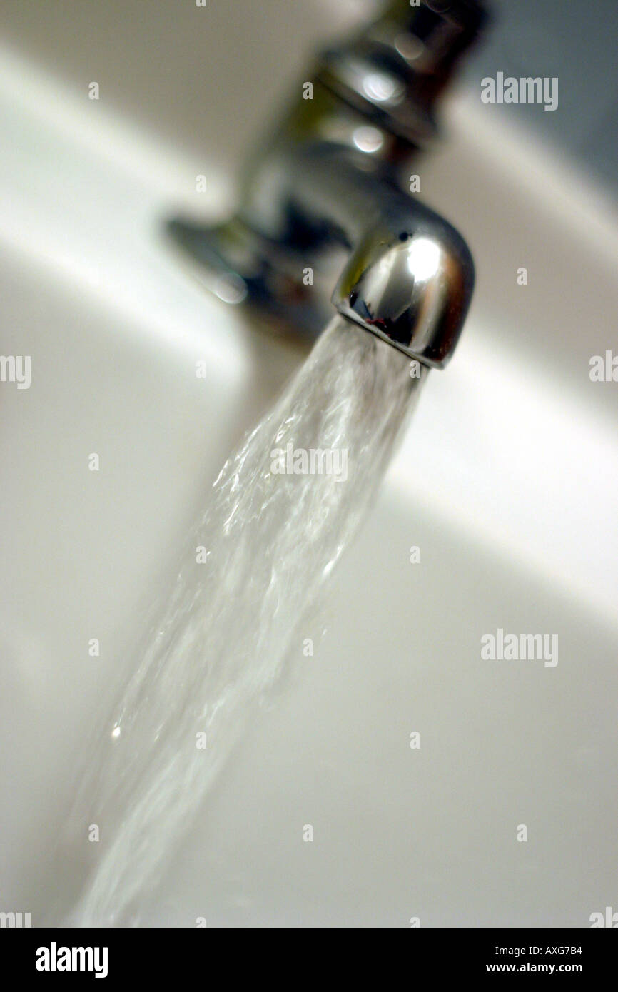 Close Up Shot Of Water Running From Old Fashioned Type Of Tap Faucet Stock Photo Alamy