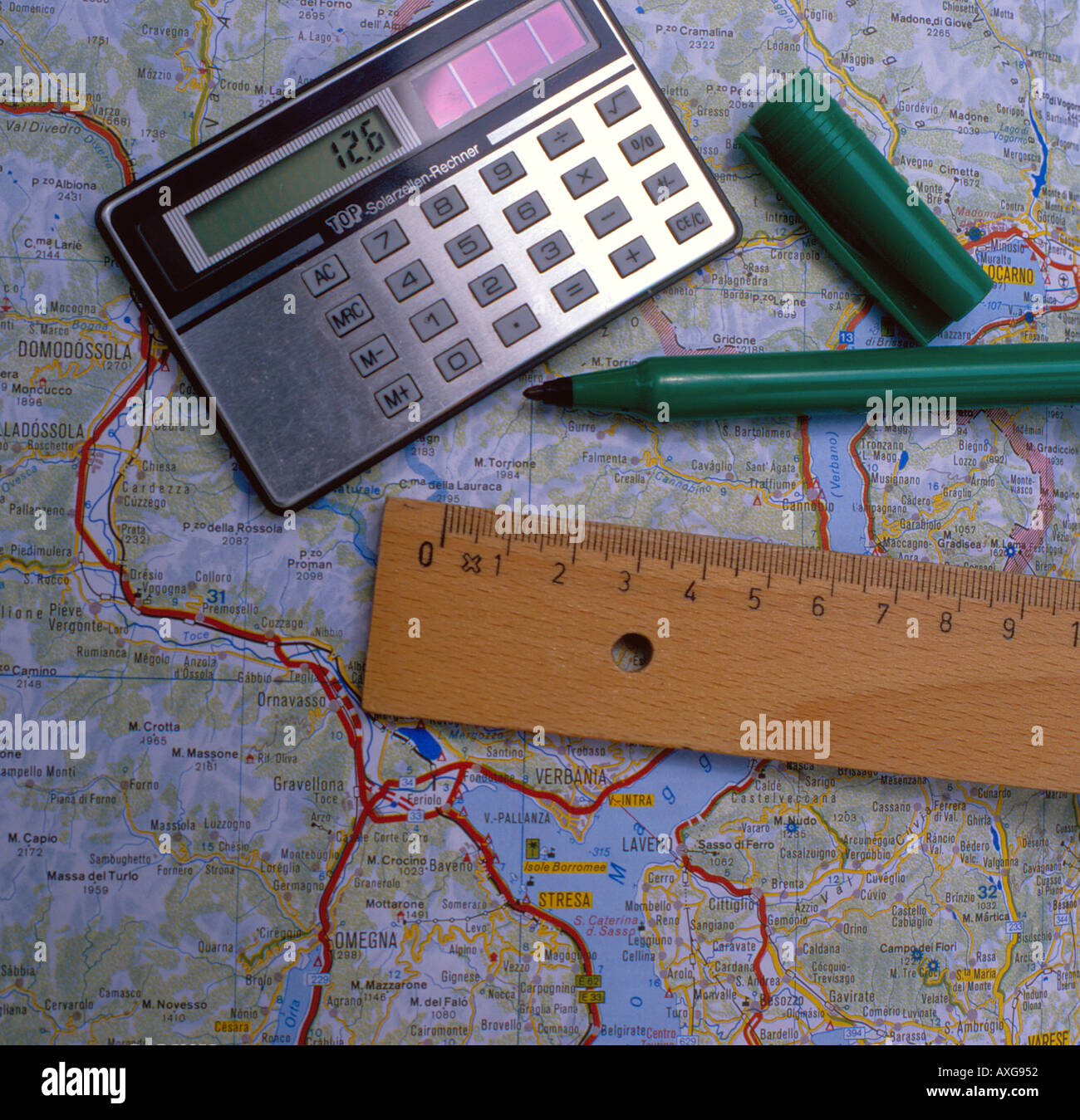 road map, calculator, ruler and pen when planning a journey. Photo by Willy  Matheisl Stock Photo - Alamy