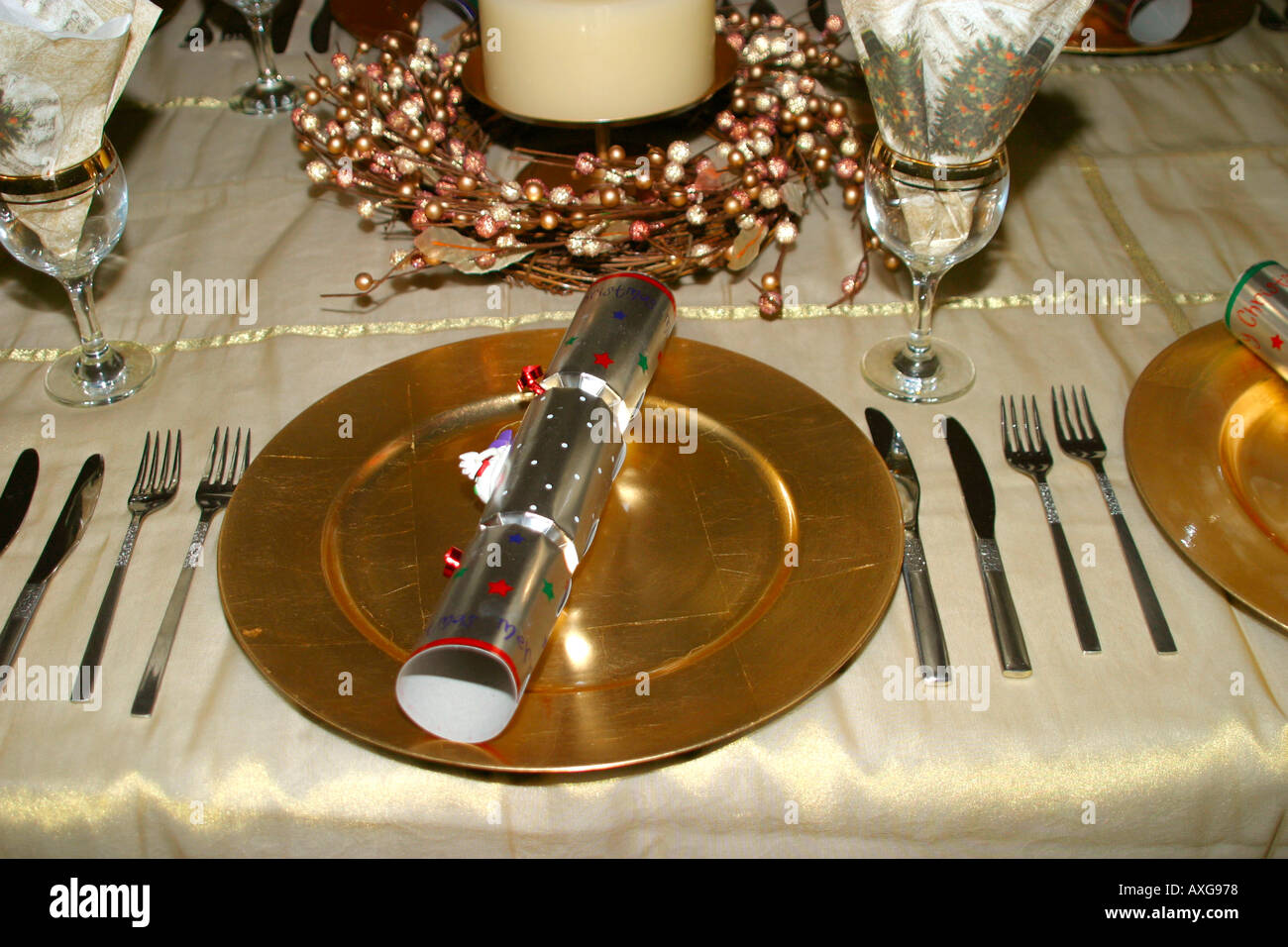 Christmas dinner place setting at table Stock Photo
