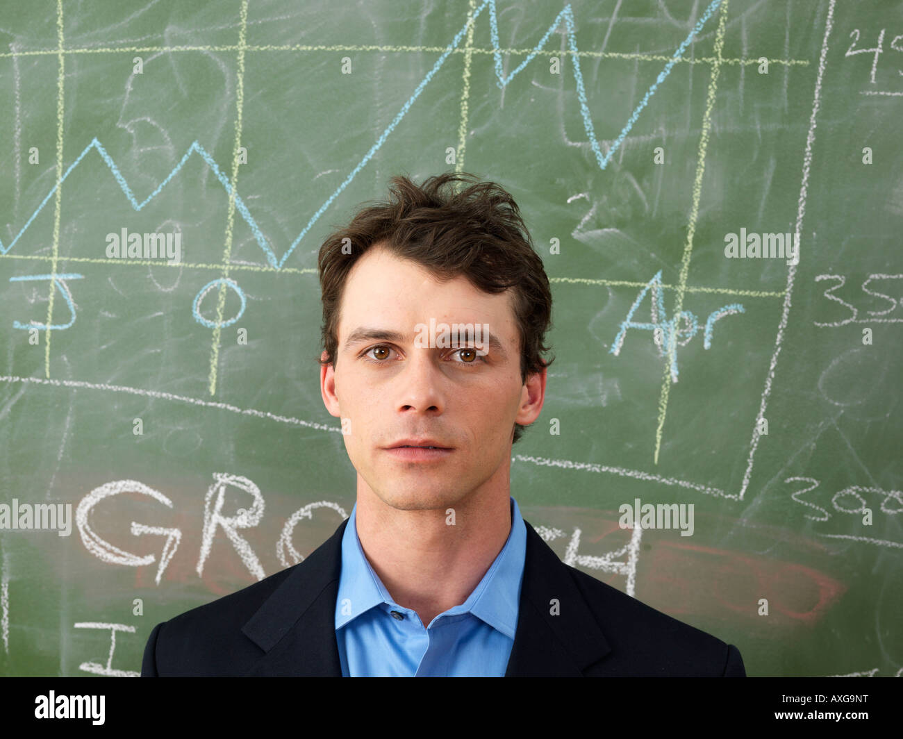 Edward pond man in front of blackboard hires stock photography and