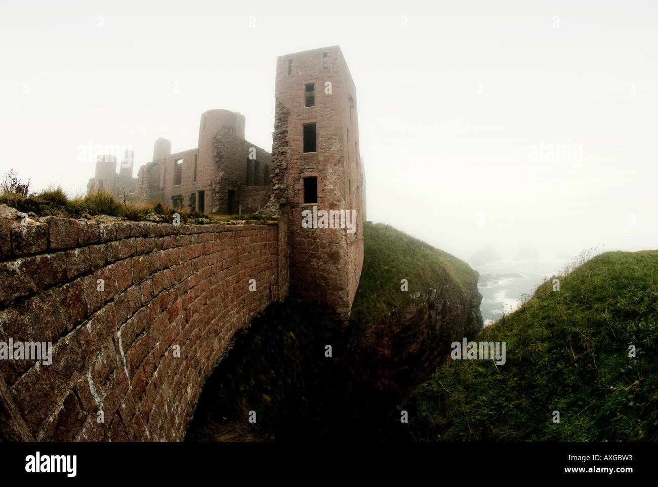 Moody Slains Castle north of aberdeen, scotland on a misty autumn day Stock Photo