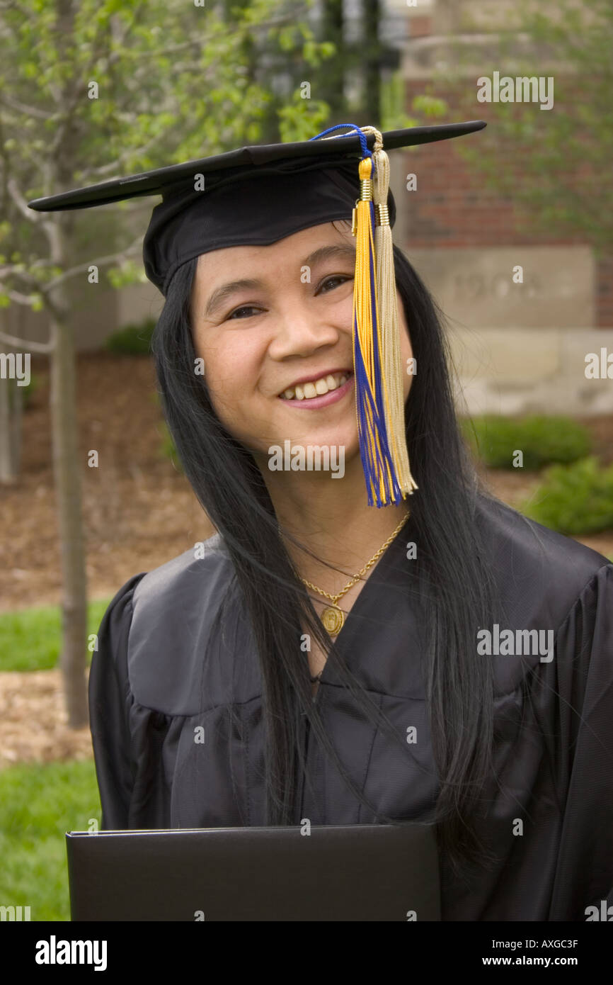 An Asian Woman just graduating from college Stock Photo - Alamy