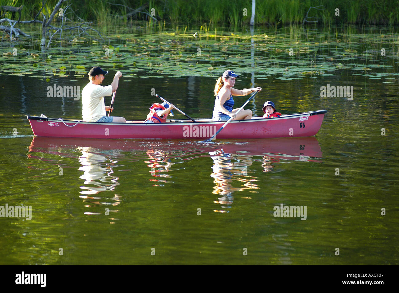 Families canoe the Au Sable River for recreation and pleasure Michigan