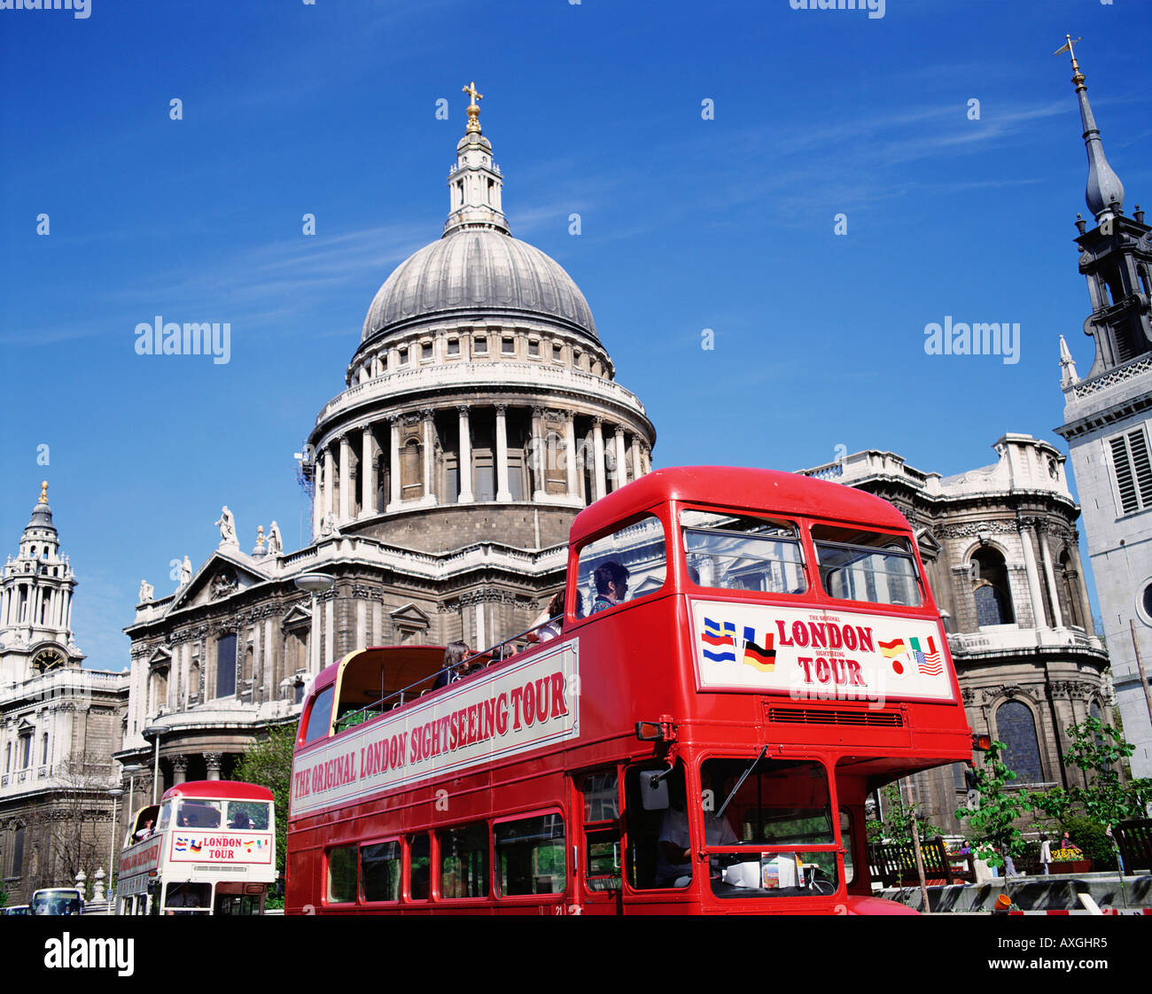Red London sightseeing open top tour bus at St Paul's Cathedral, London England, Great Britain GB UK.The Original London Sightseeing Tour Bus. Red bus Stock Photo