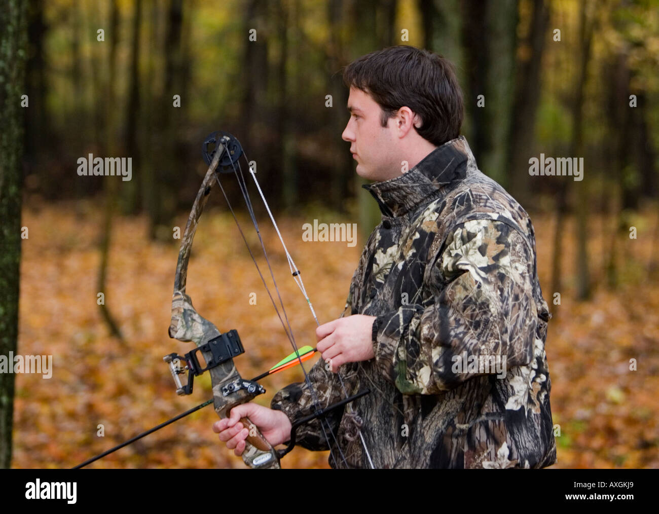 Hunter with a bow and arrow Stock Photo Alamy
