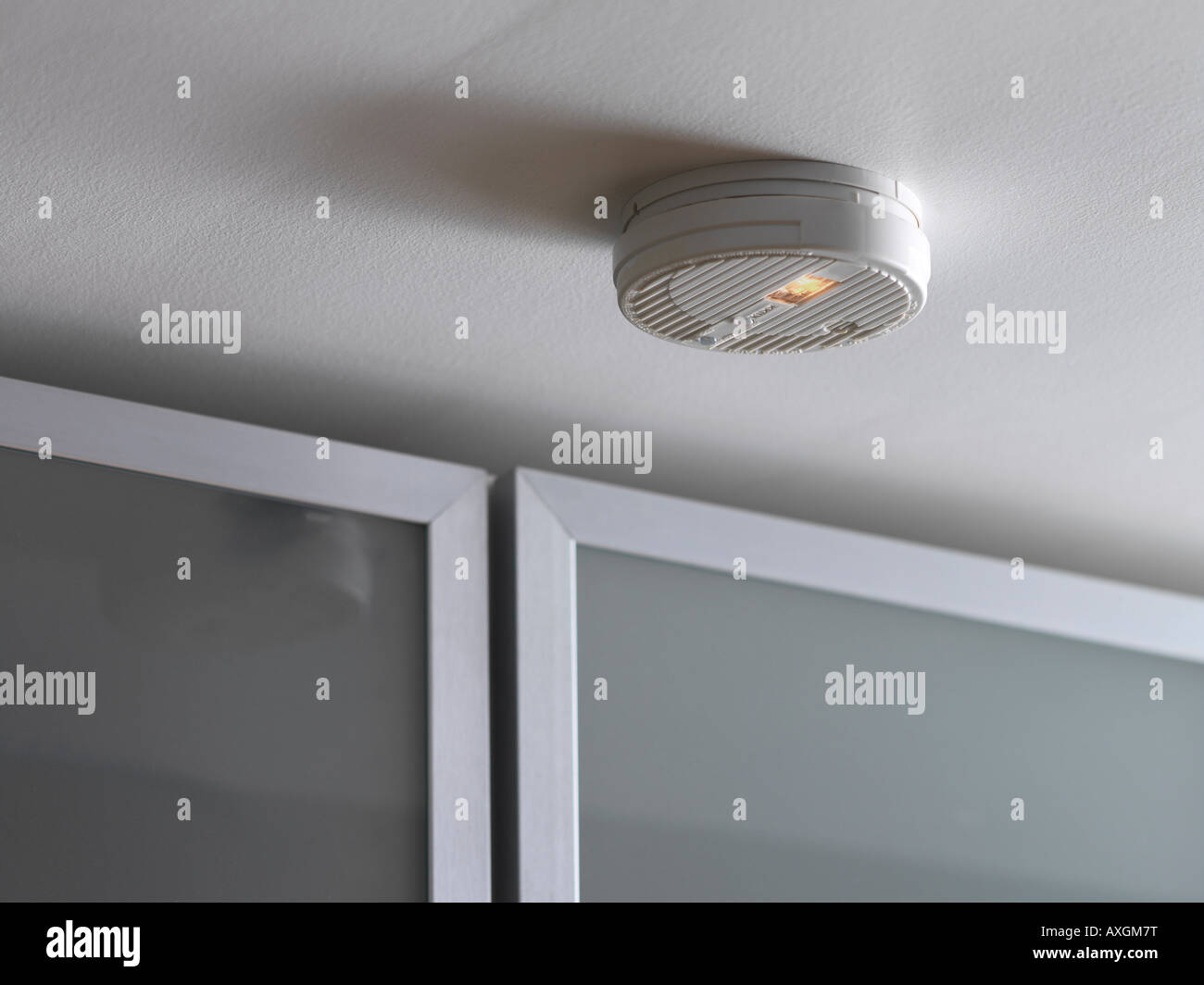 Smoke Detector on Ceiling Stock Photo