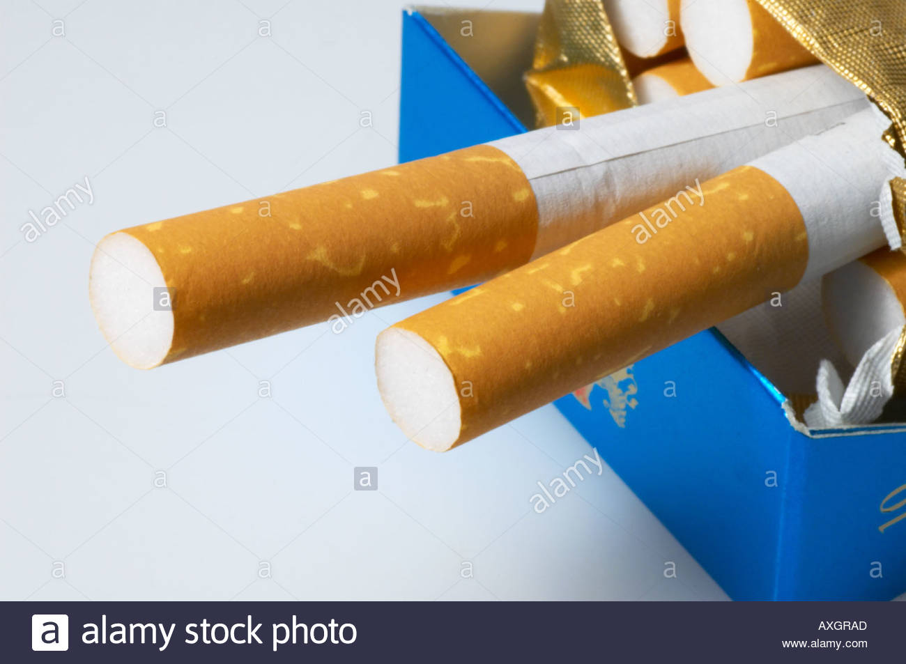 Red white and blue packet of Royals Superkings cigarettes with smoking  seriously damages health warning UK Stock Photo - Alamy