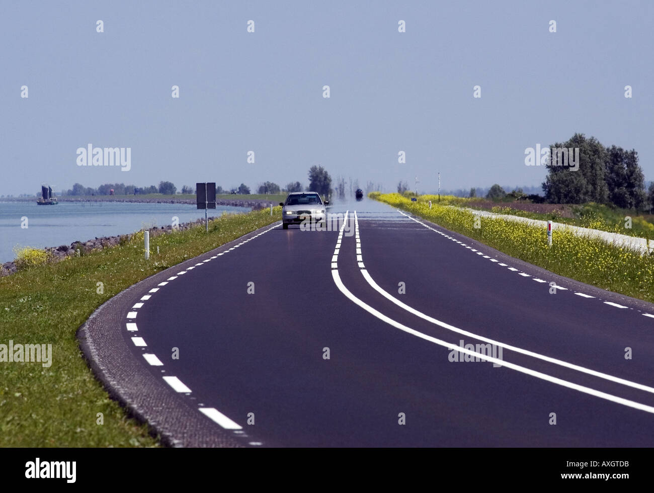 road on dyke Stock Photo Alamy
