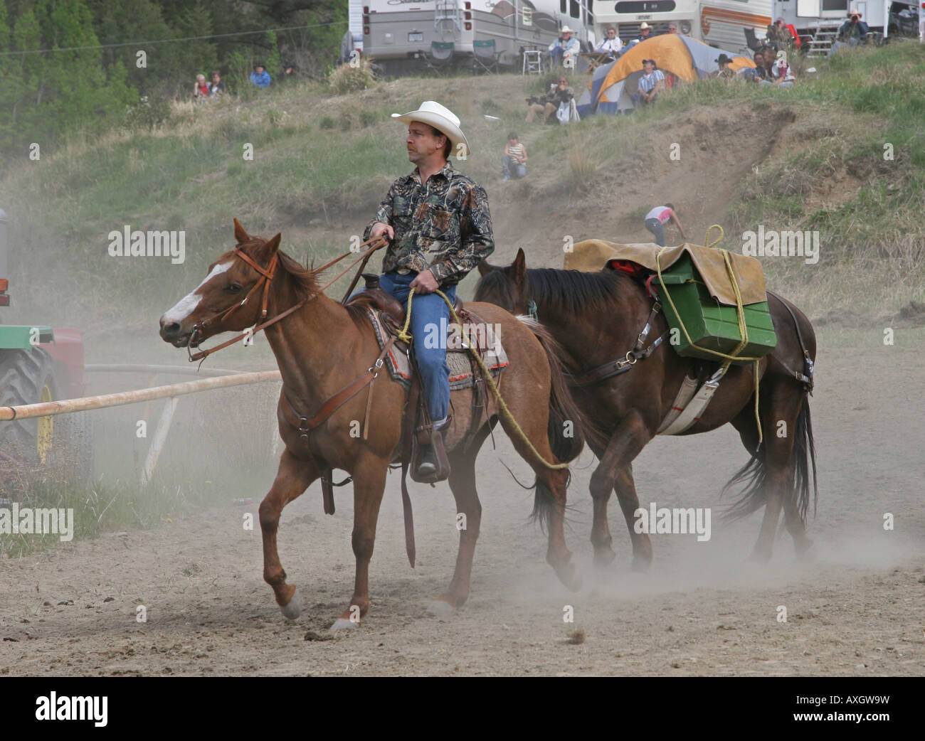 Cowboy waiting for the pack horse race at a rodeo Stock Photo Alamy