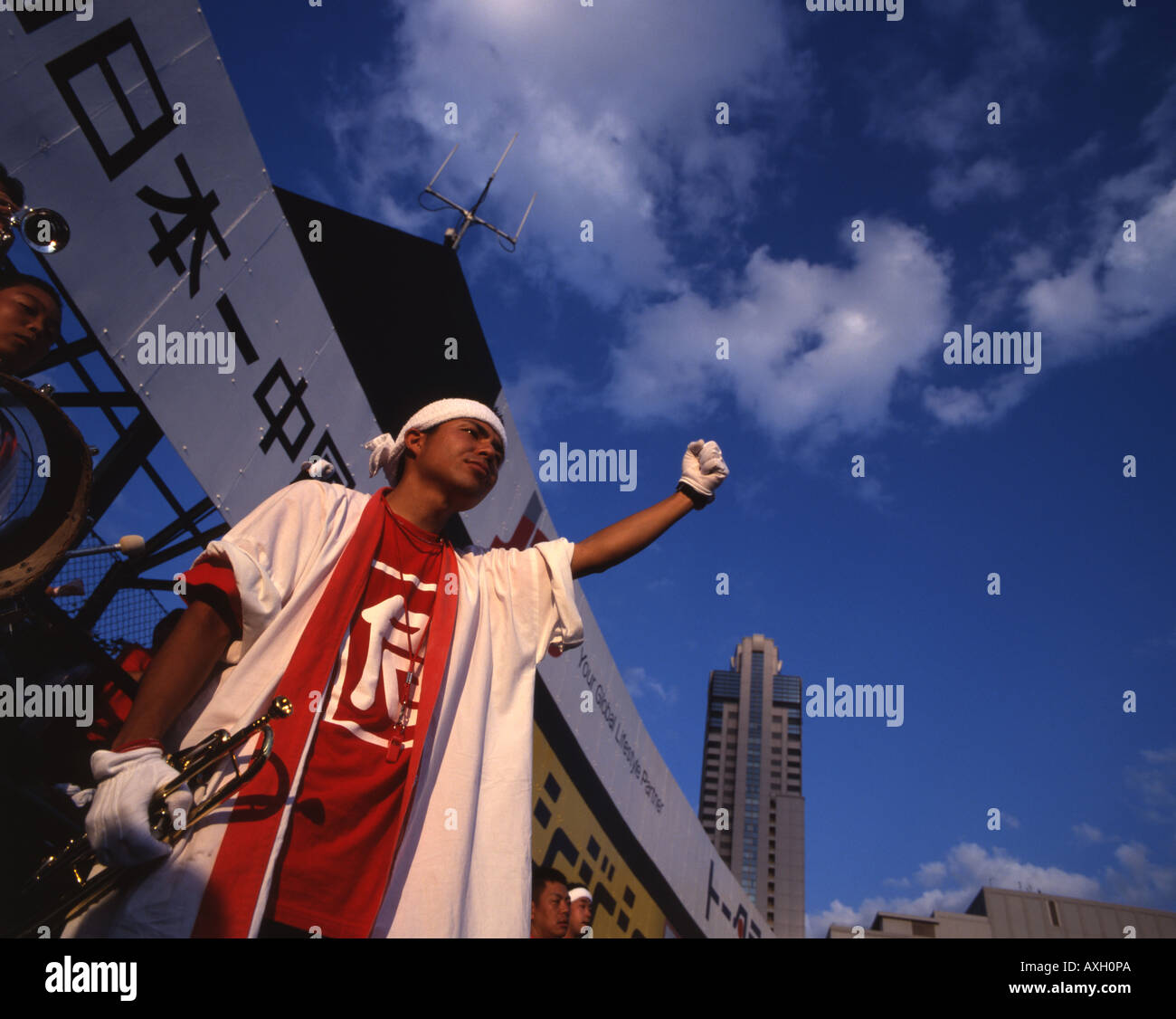 Japanese baseball fans of Hiroshima Carp cheer their team on at